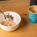 Putting ice cream from Polar-Latte into a bowl.