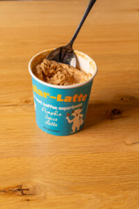 Pumpkin Spice Latte ice cream coffee with spoon.